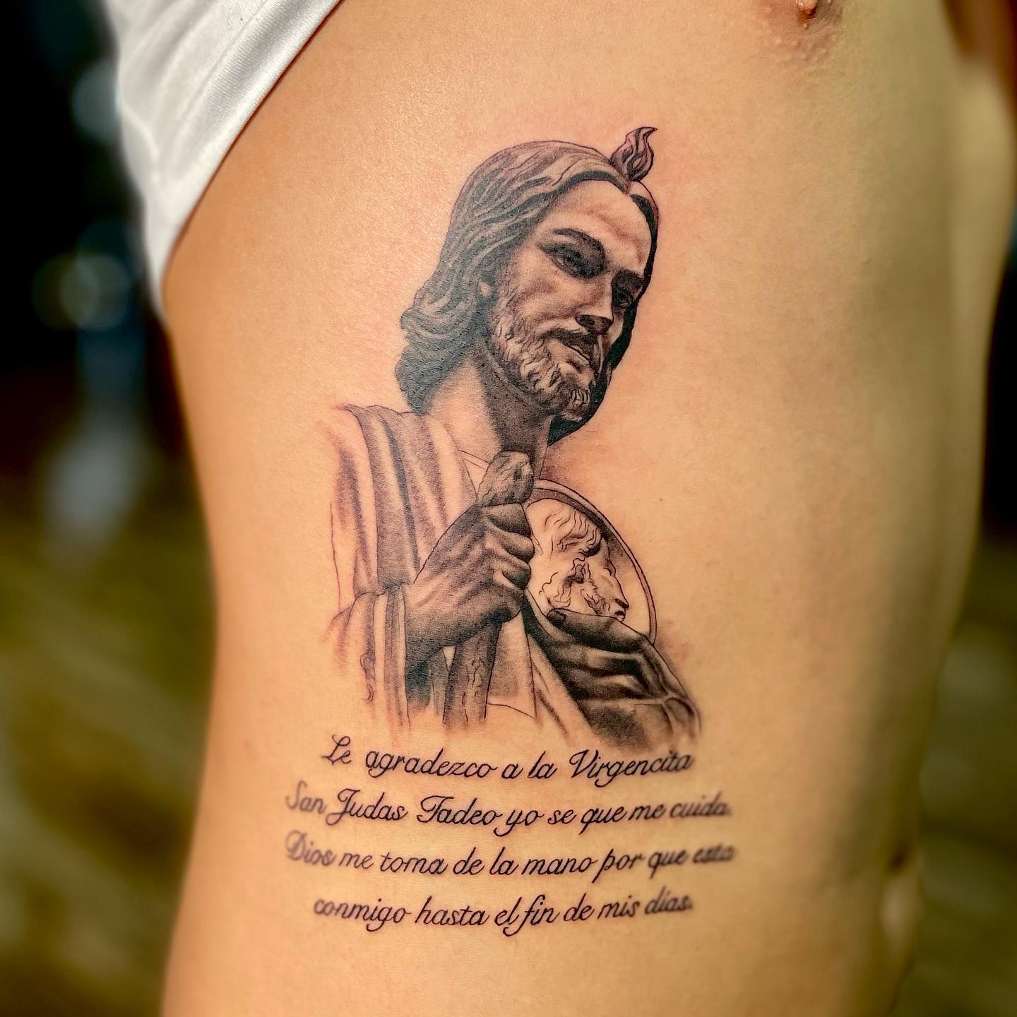 Tatuaje de San Judas con cita.