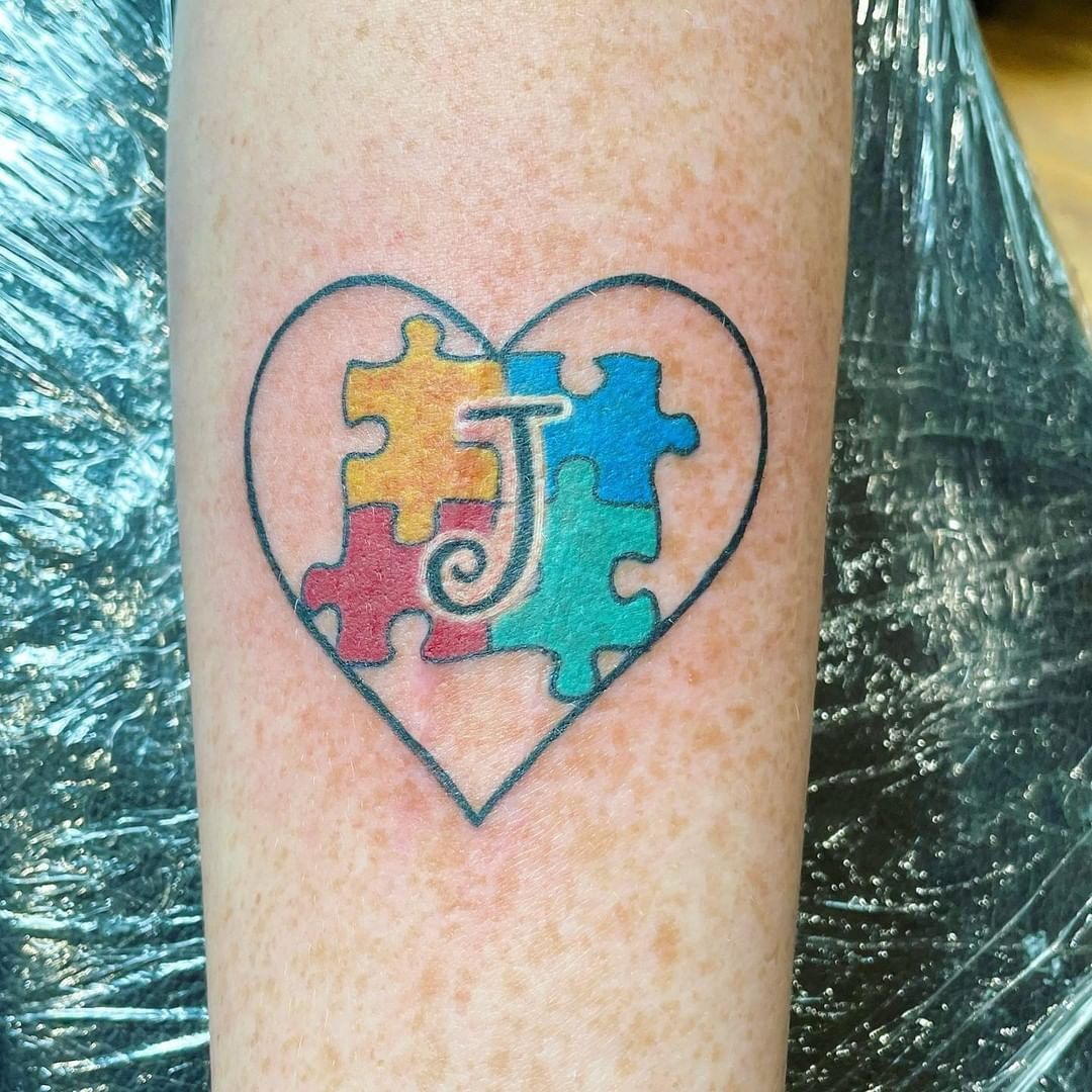 Tatuaje de autismo, impresión de corazón.