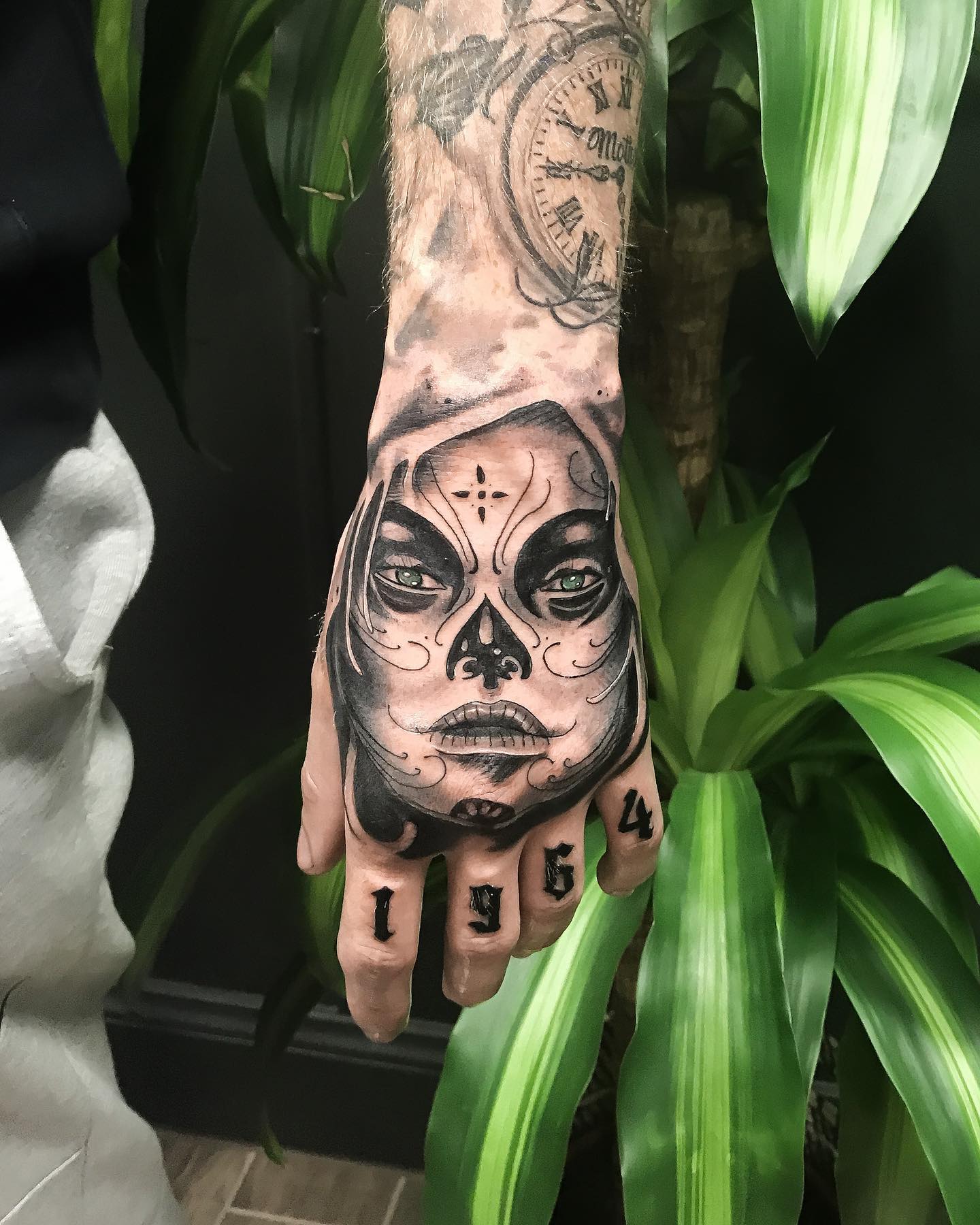 Tatuaje de Mano de Santa Muerte