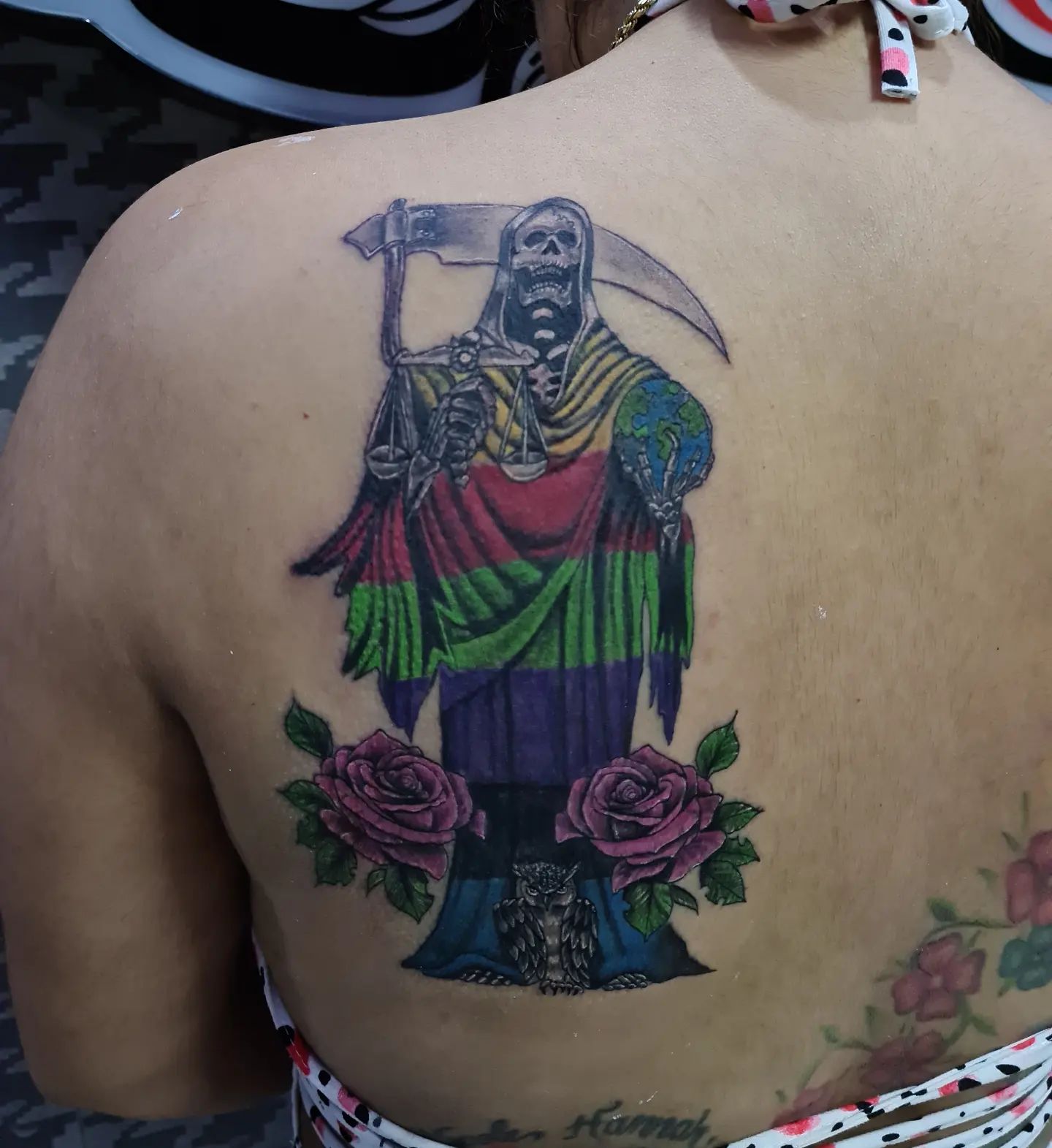 Tatuaje de Santa Muerte en la espalda