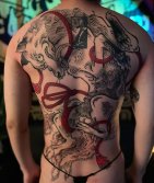 Tatuaje de Kitsune Gigante en la Espalda